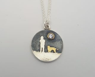 Dog lover white sapphire round pendant by Charlotte Lowe