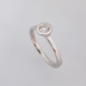 Striking Bezel Set Diamond Solitaire