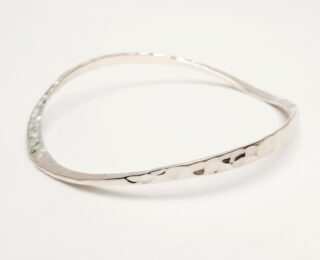 Forged and planished silver bangle